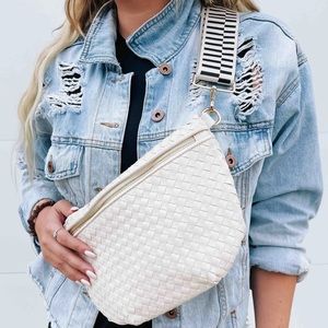 Cream bum bag with adjustable guitar strap